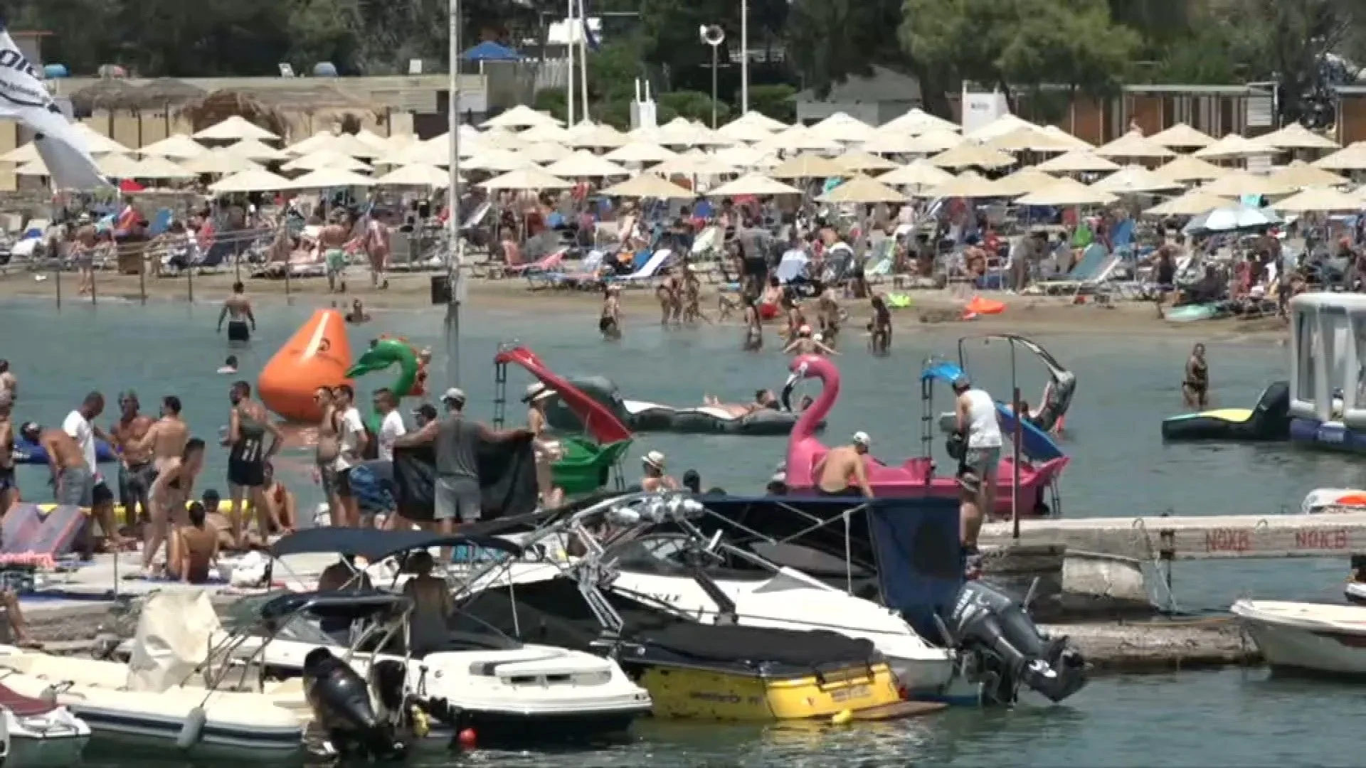 Crowds flock to Athens beach as Greece opens up for tourists